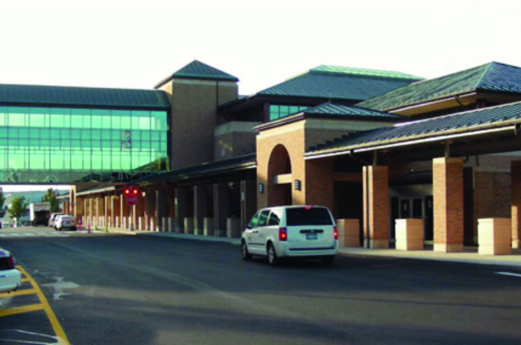Yorktown Taxi 3 Yorktown taxi arriving at an airport terminal on a flat rate with tolls included