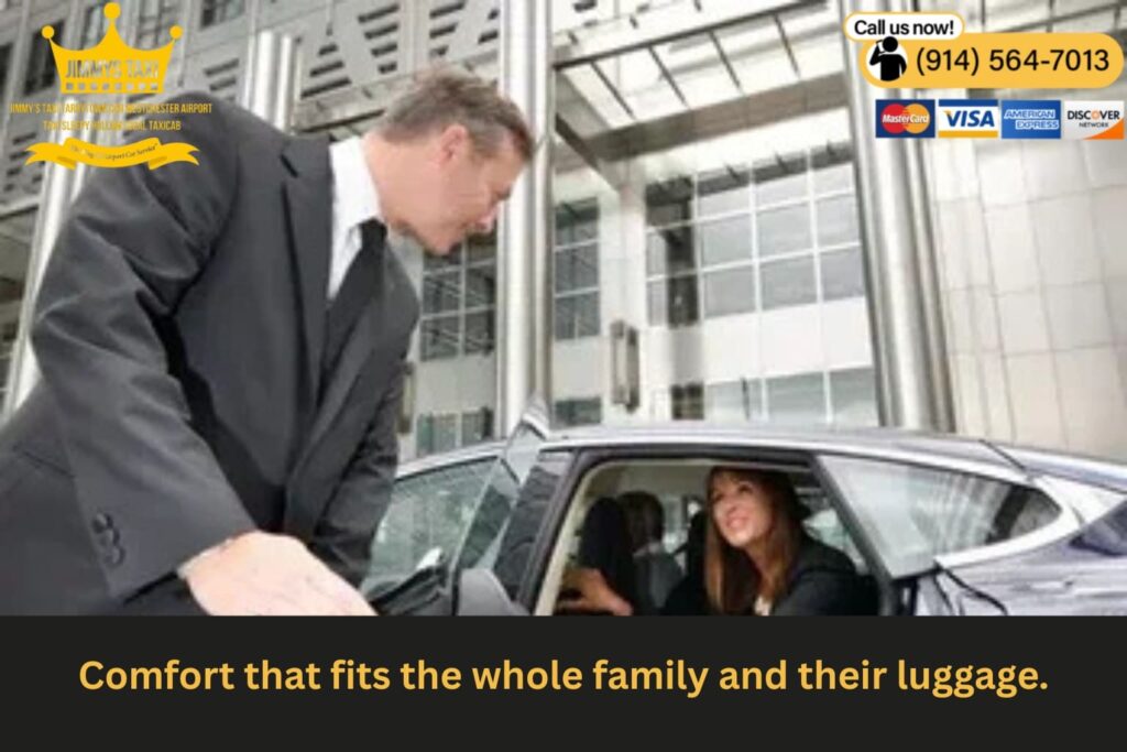 Spacious black SUV with an open trunk and child seat.