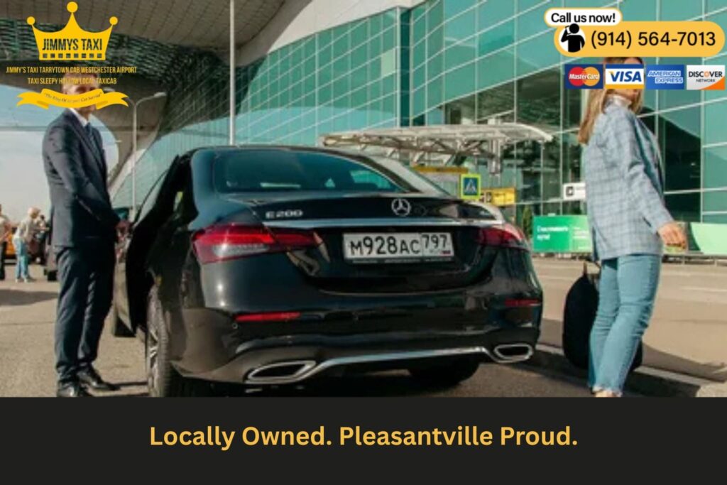Chauffeur standing beside branded car with Pleasantville signage nearby
