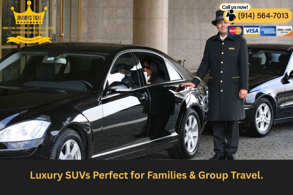 Black SUV with open trunk loaded with suitcases.