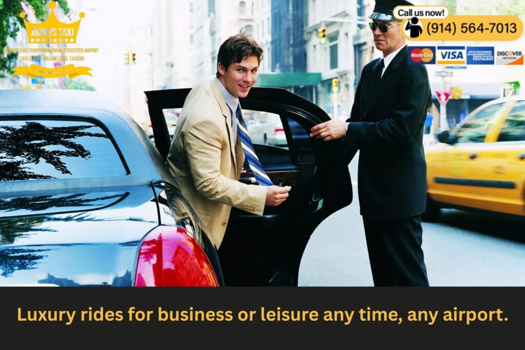 Executive sitting in rear seat with laptop.