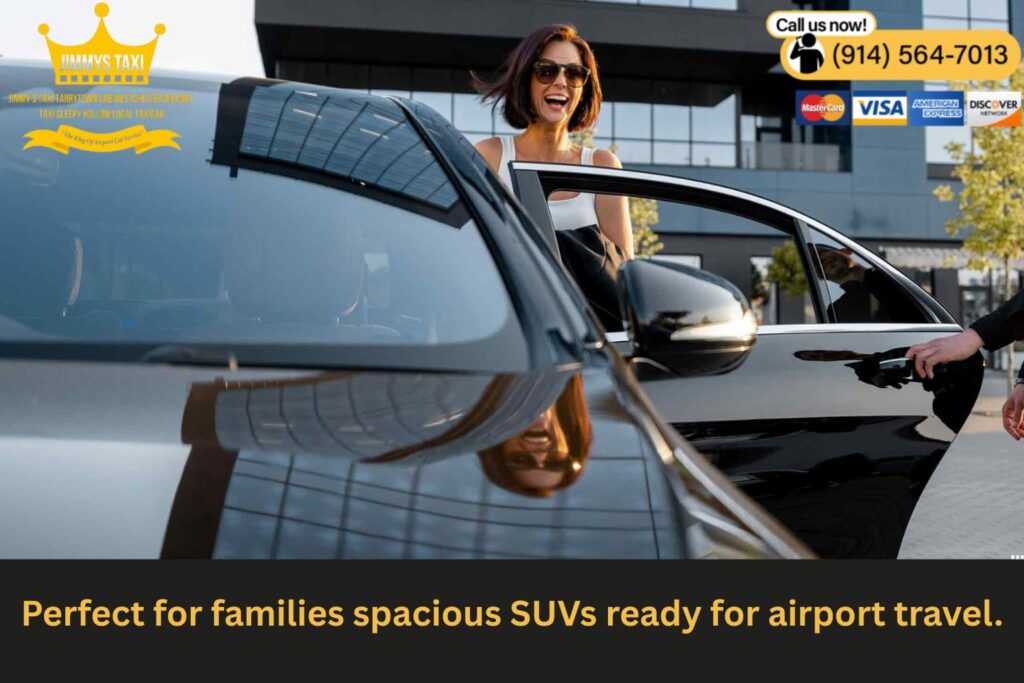 Black SUV with open trunk being loaded with family luggage