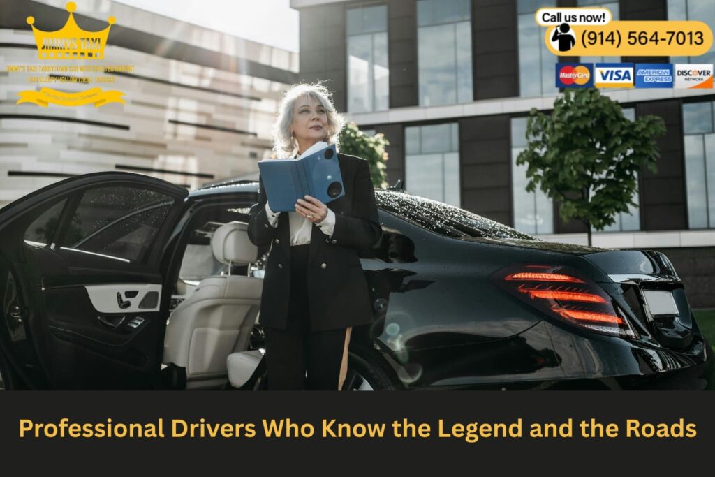 Chauffeur standing beside black SUV in front of the Old Dutch Church