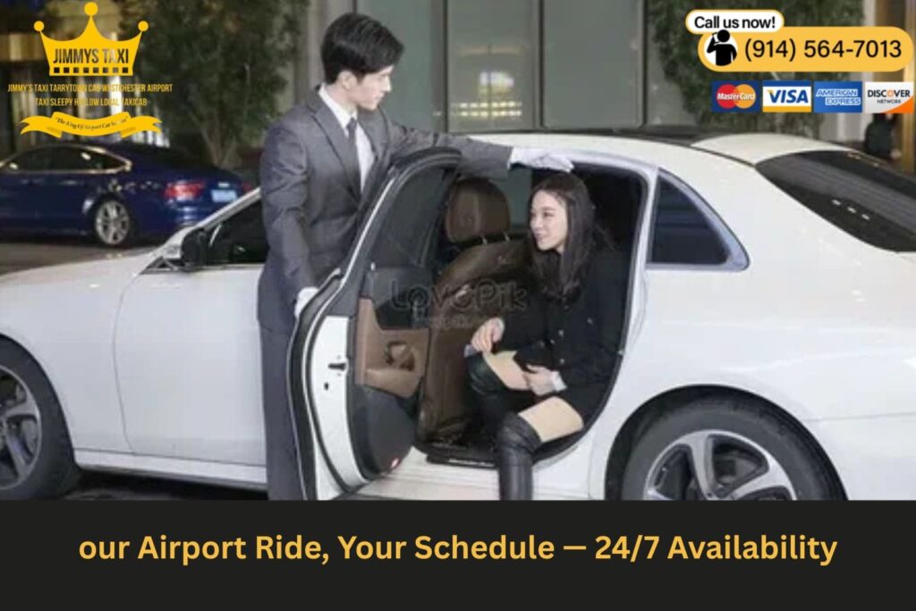 Car pulling up to an airport at night