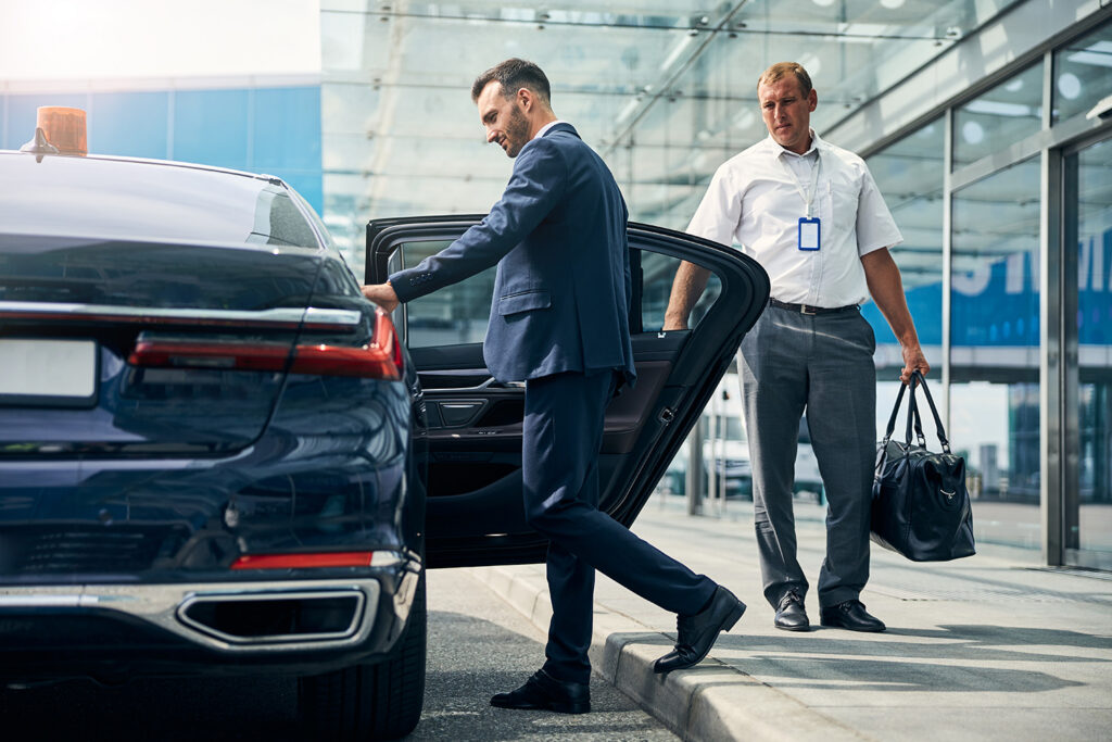 Eastchester taxi collecting a passenger and luggage before an early flat-rate airport run