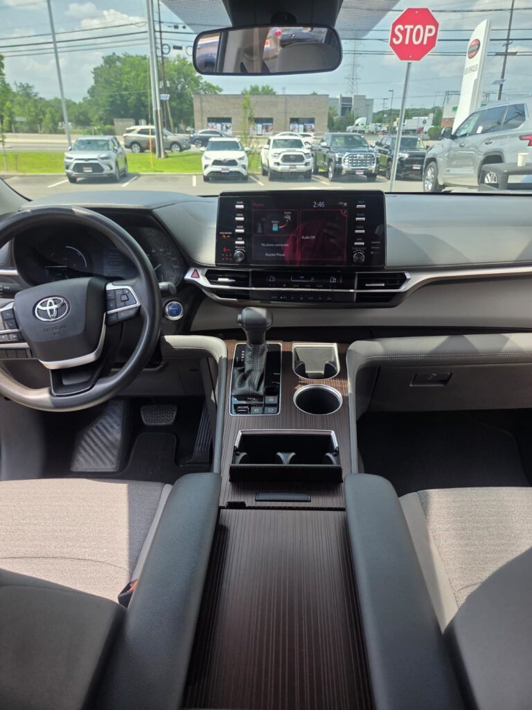 Inside a Jimmys Taxi Sienna in Tarrytown, clean cabin with no meter on the dash